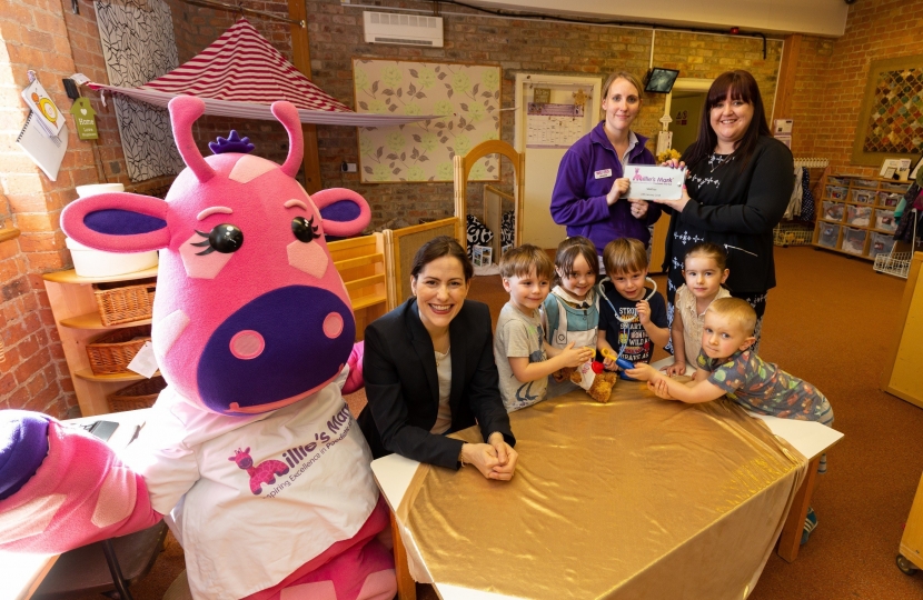 Millie the Giraffe and children at Wellies Nursery