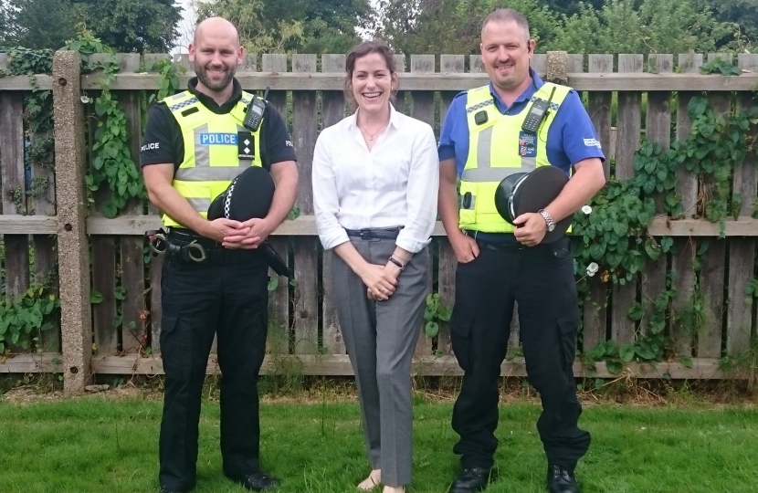 Victoria with police officers