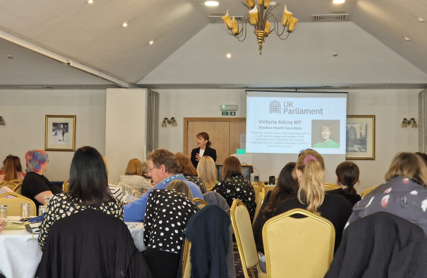 Victoria speaking at the conference