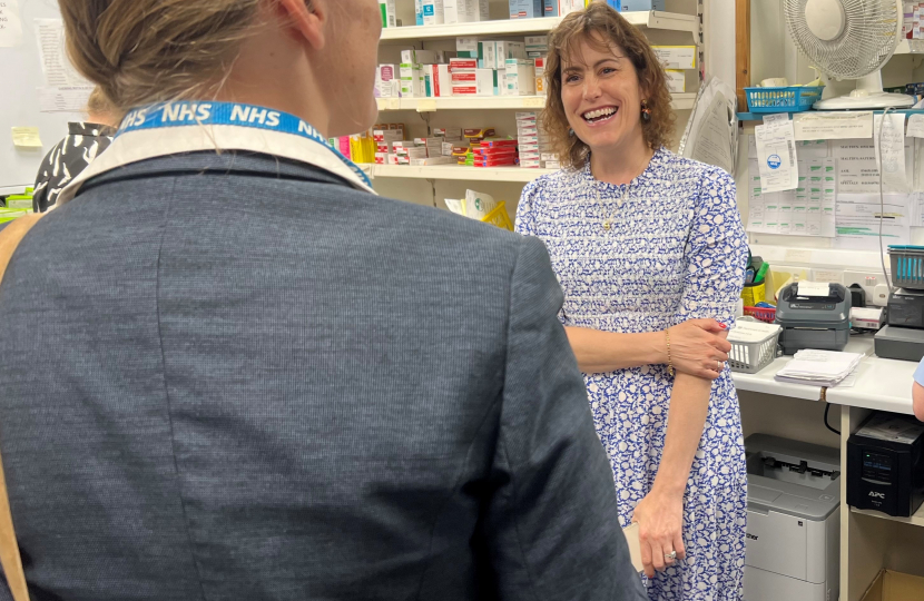 Victoria in conversation at Louth Pharmacy with Dr Latham-Green.