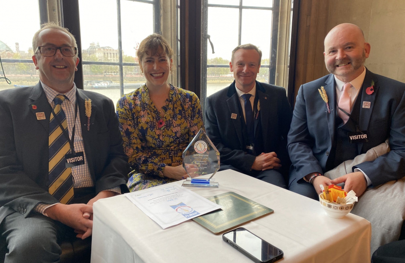 Ian Watson, Victoria Atkins, Mark Baxter & Jamie Patton awarding Ian East Midlands Community Hero