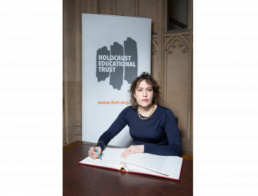 Victoria Atkins signing the Holocaust Book of Commitment