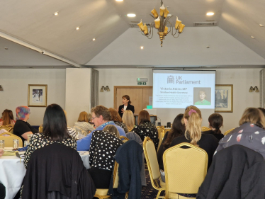 Victoria speaking at the conference